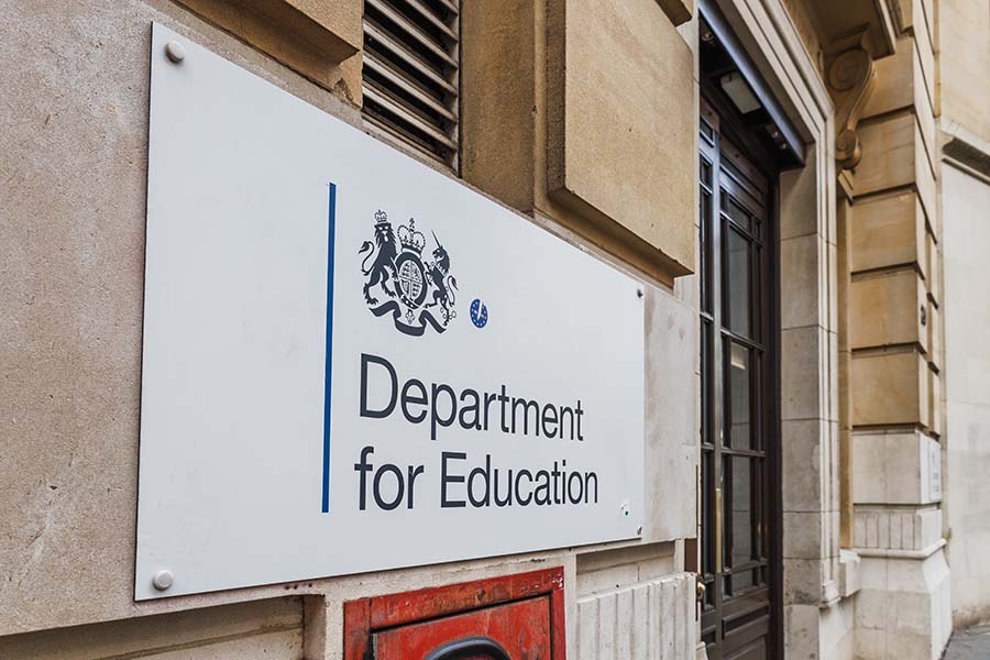 An exterior sign at the Department for Education