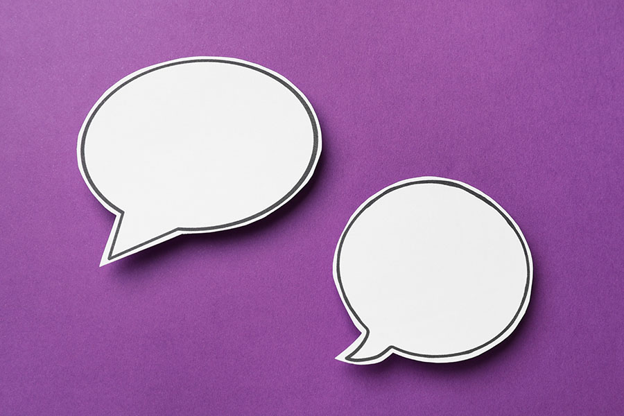 Speech bubbles against a purple background