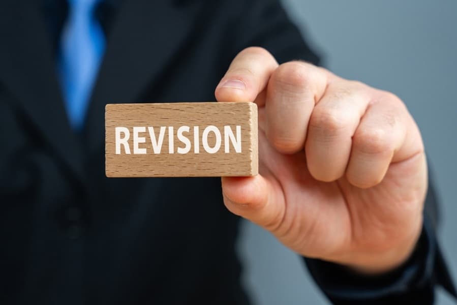 Wooden block saying Revision