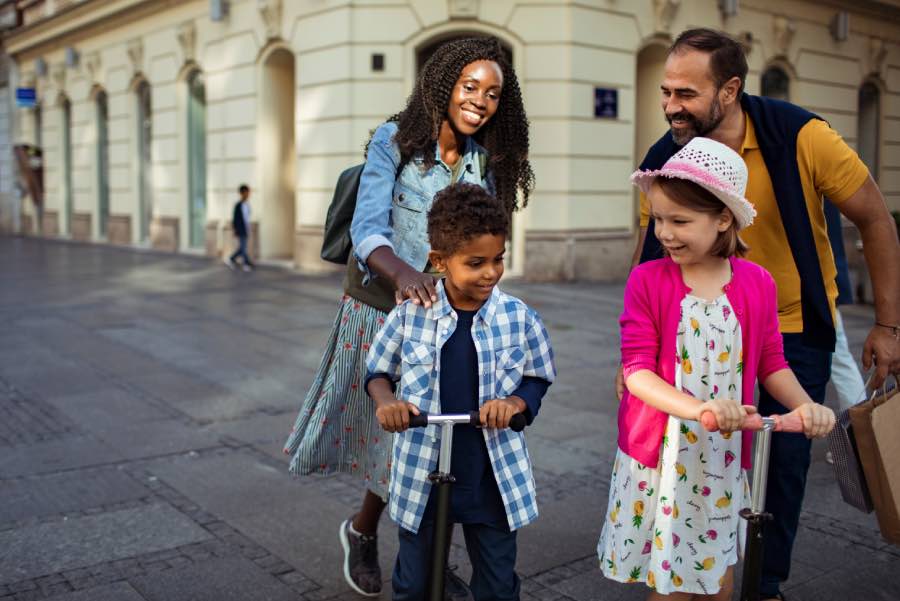 A smiling mixed-race blended family