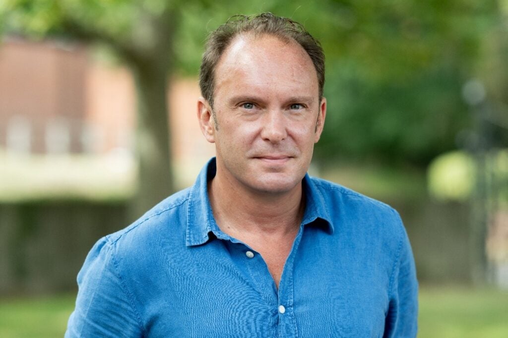 A head shot of a solicitor